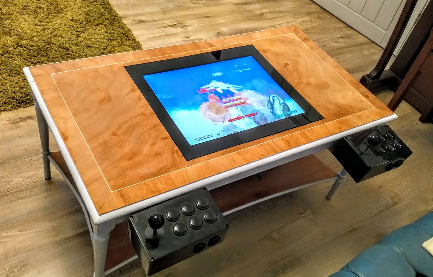 Coffee table arcade machine.
